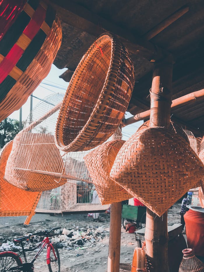about-01 Beautiful handwoven baskets on display at a market stall in Ashuganj, showcasing traditional craftsmanship.